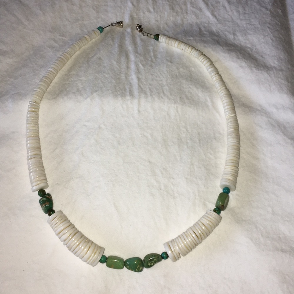 Turquoise and pukka necklace